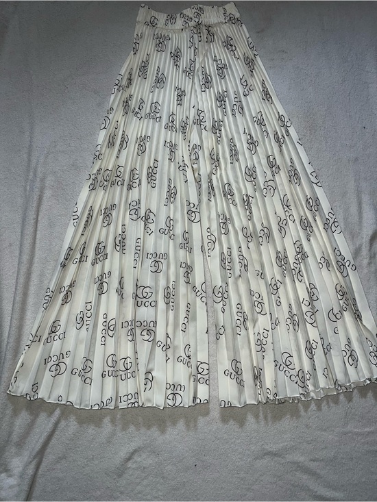 Gucci Dresses & Skirts - Gucci White Pleated Skirt with Black Logo Print
